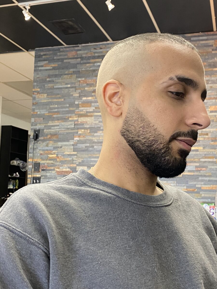 Skin fade with sculpted beard